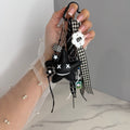 BLACK STAR BAG CHARM | CHECKERED KEYCHAIN